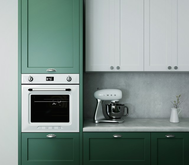 A clean, modern kitchen counter and stove.